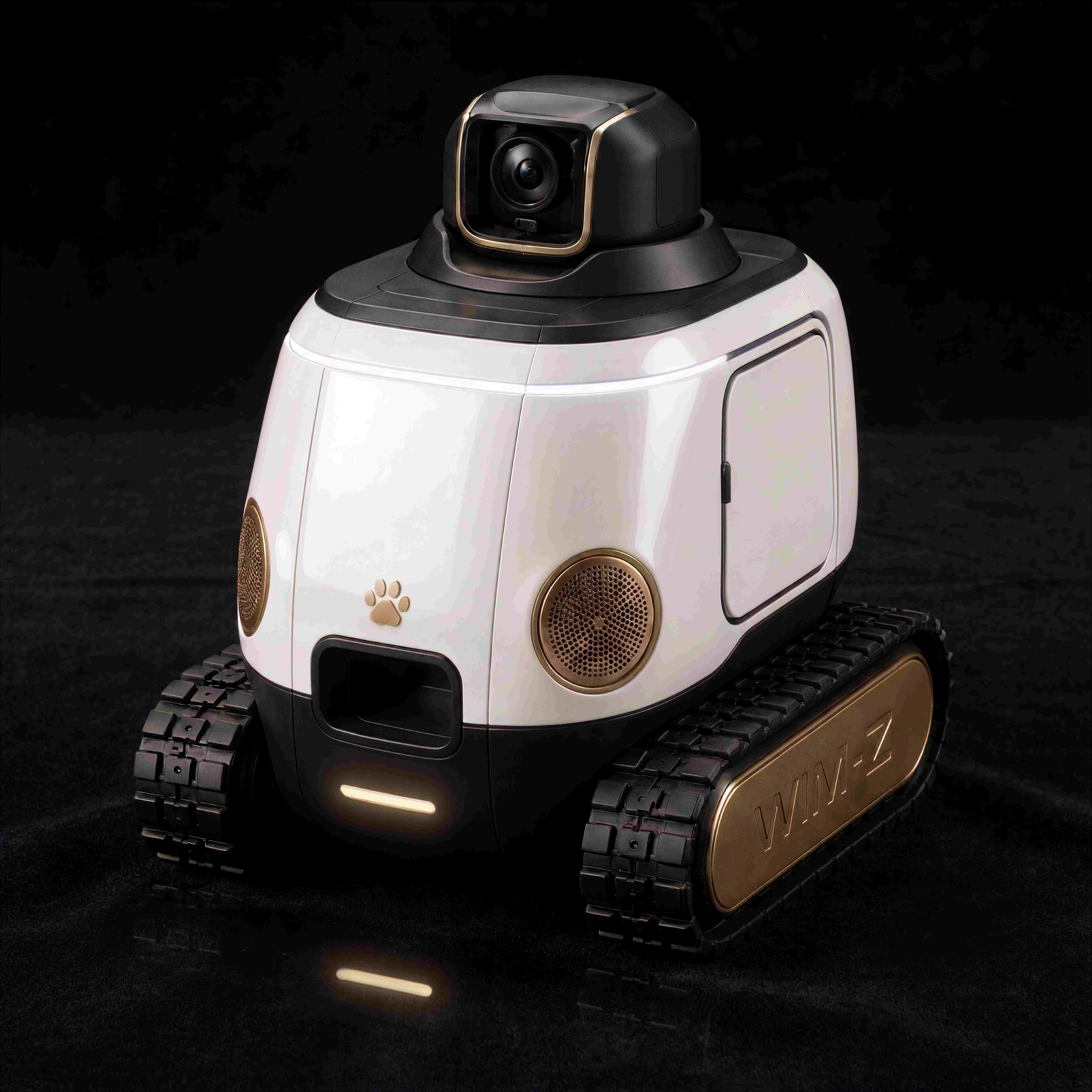 WIM-Z home robot with pan-tilt camera turret and tank treads on a dramatic dark background
