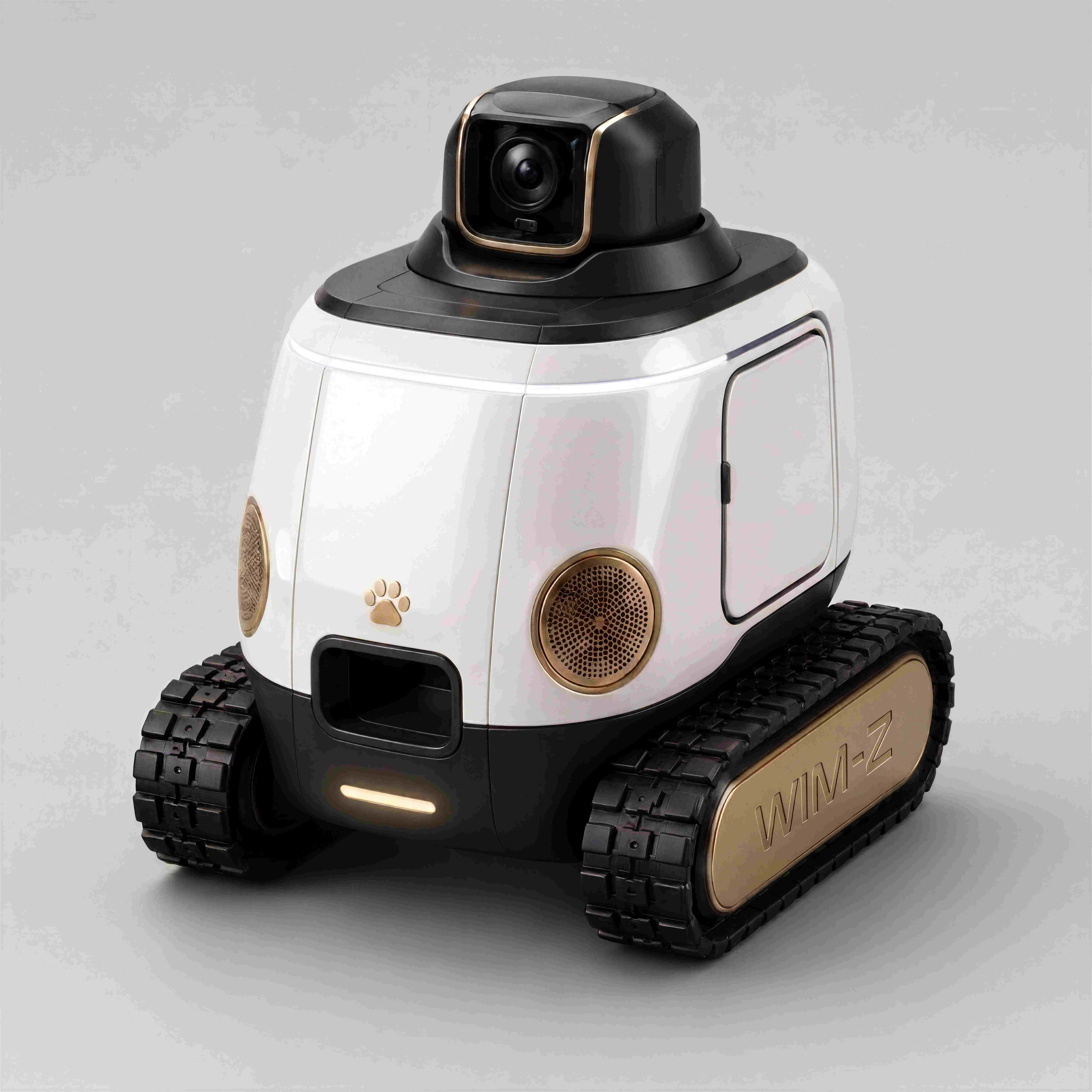 WIM-Z, a white and gold mobile home robot with a pan-tilt camera turret and all-terrain tank treads